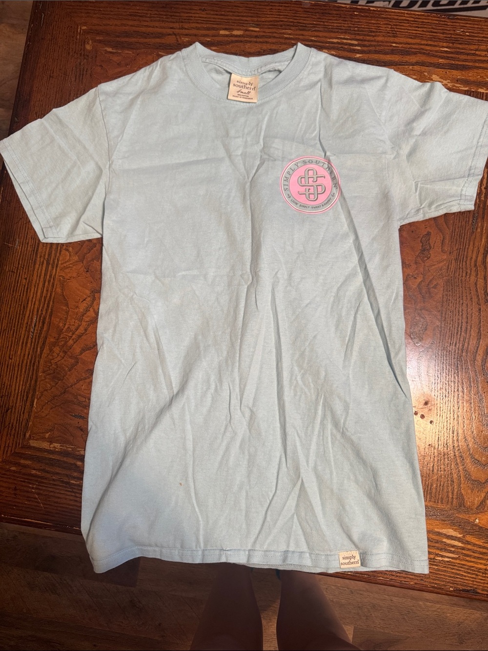 Simply Southern Pale Blue Short Sleeve Tee with Pink Chest Emblem
